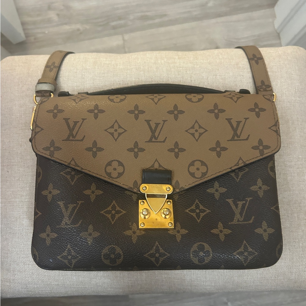 LOUIS VITTON Pochette Métis